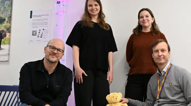 Photo of four people