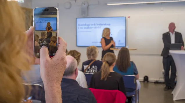 Photo of hand taking a photo