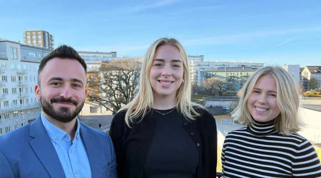 Photo of three students.