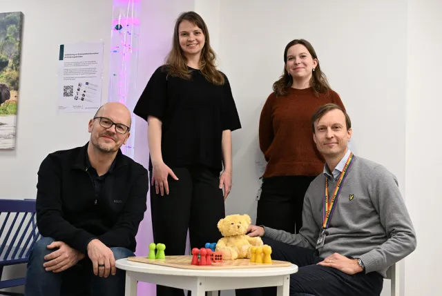 Photo of four people